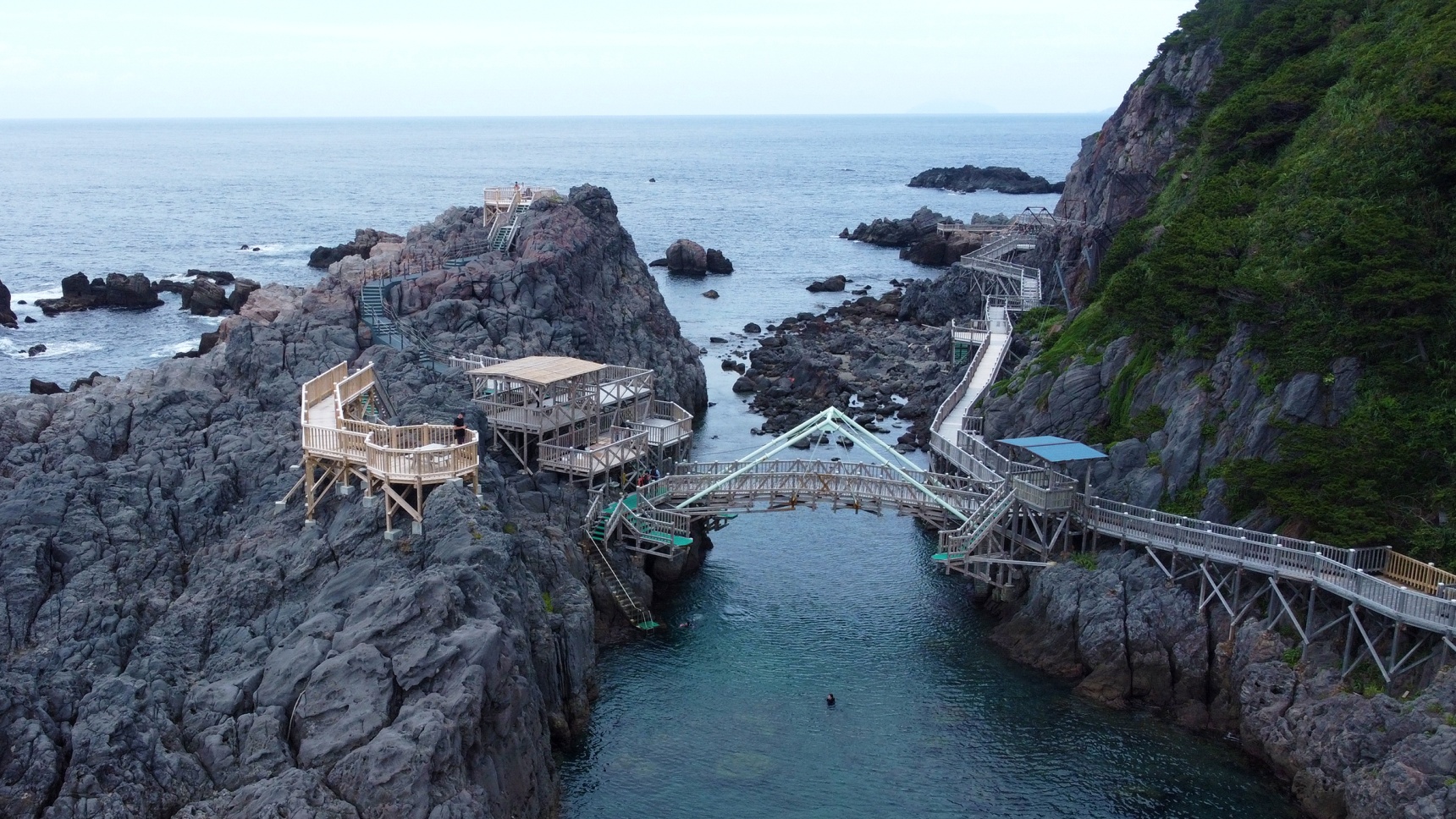 The Clear Water, Black Stone, and Dark Skies of Kozushima